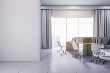 Front view on light grey wall with place for advertising poster or frame in modern sunlit open space office with light interior design, table and white chairs on glossy floor. 3D rendering, mock up