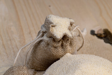 Semolina poured into a cotton bag ready for cooking