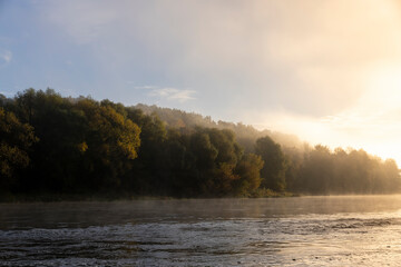 A little fog on the river in autumn