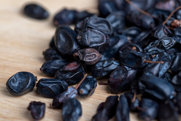 Black spices of dried barberry for cooking meat
