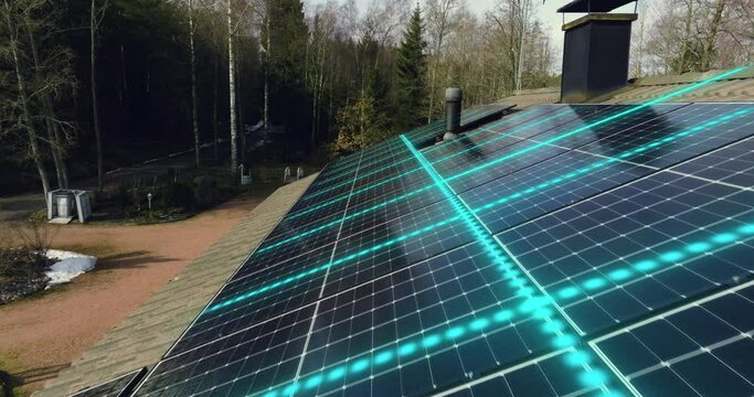 Aerial view over a house collecting sun power with solar cells - Visual effect
