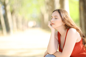 Woman relaxing and resting in a park