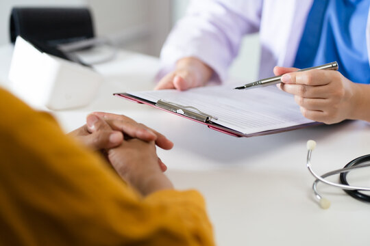 Healthcare. Doctor And Patient Are Discussing interview Consulting Patient. Professional Medical Doctor In The Hospital. Healthcare And Medical Concept