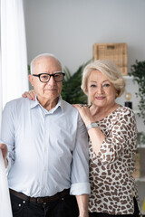 Portrait of elderly couple at home