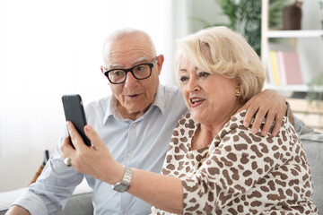 Elderly couple talking on video call