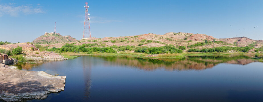 Beautiful panorama of lake of Jaswant Thada cenotaph. Jodhpur, Rajasthan, India. Thar desert and blue sky in the background.