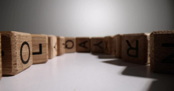 Cubes with English alphabet and speed reading. Dyslexia and reading and writing impairment