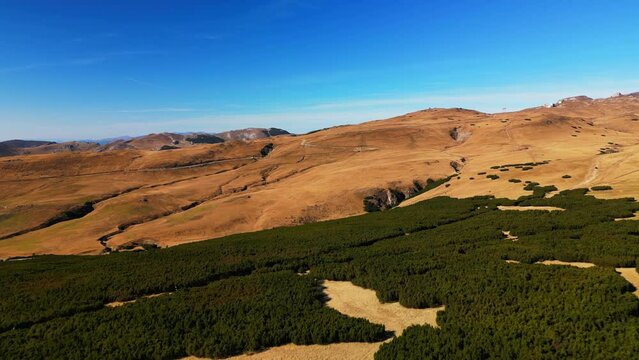 drone revealing scenic natural landscape mountains in prahova valley pietra arsa famous destination in Romania