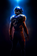 American football player on dark background.