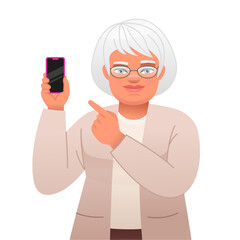 Elderly woman with glasses points to the phone in her hand. Old gray-haired grandmother advertises an application in a smartphone.