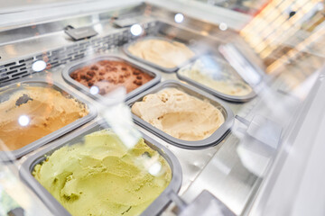 A variety of sugar-free vegan ice cream with natural ingredients on display at the gelateria. Flavors various ice cream in Rome, Italy. Italian gelateria. Natural fresh ice cream.