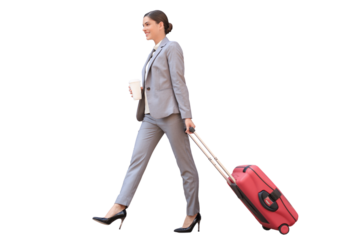 Portrait of successful business woman going in suit pulling luggage while walking on a transparent background