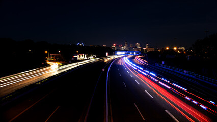 Frankfurt am Main city highway at night. Long exposure of the street. Light beams from the cars.