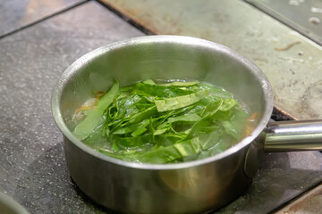 Saucepan with assortment of vegetables to make broth