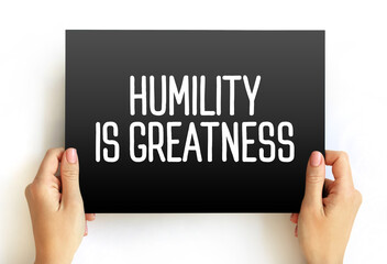 Humility Is Greatness text on card, concept background