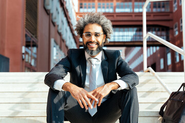 Image of a young entrepreneur working outdoor the office