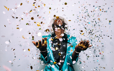 portrait of an hip hop music performer with confetti drop