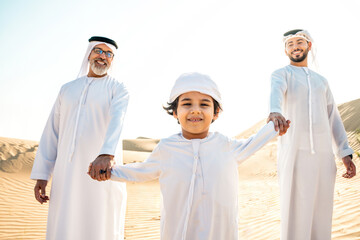 Three generation family making a safari in the desert of Dubai