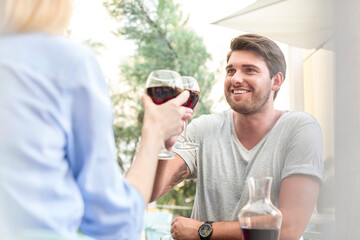 Couple toasting wine glasses