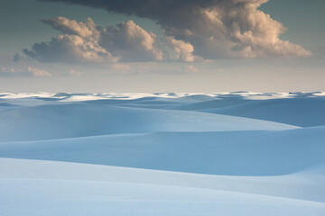 Clouds over tranquil white sdunes, White Sands, New Mexico, United States