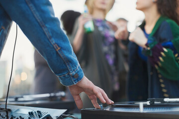 DJ spinning records at party
