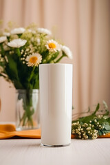 Elegant White Tumbler Mockup with Flower Vases on White Table: Stylish Beverage Container Photography