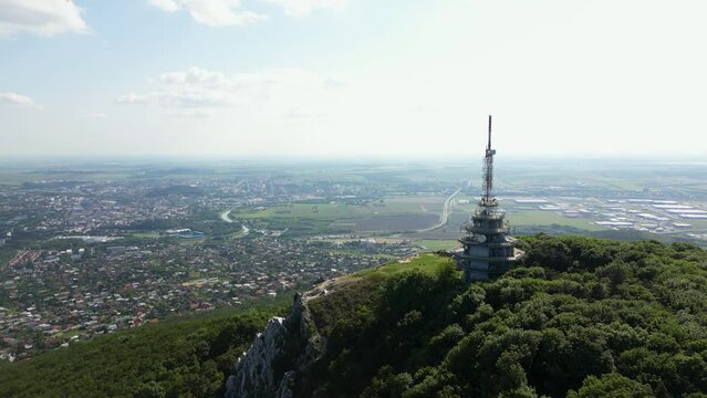 Stunning aerial view of Nitra in the background of Pyramid Radio tower, 4k