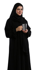 saudi arabian woman in hijaab standing with coffee mug in hand and facing camera with smile side...
