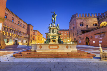 Bologna, Italy with the Fountain of Neptune at twilight.