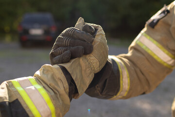 handshake of two firefighters. close-up image