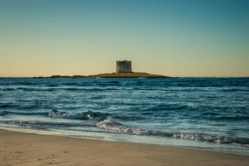 Photo sur Plexiglas Plage de La Pelosa, Sardaigne, Italie Stintino tower in Pelosa beach in Sardinia, Italy