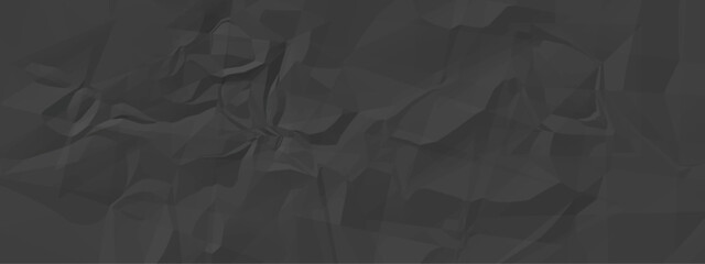Black crumpled paper texture with folds, black background, wallpaper. Natural abstract textured background of wrinkled black paper.