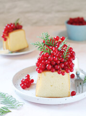 A biscuit decorated with red currant