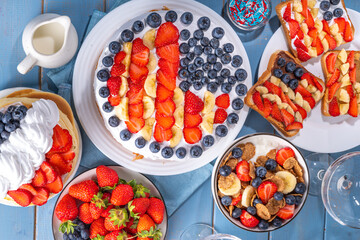 Fourth of July, Patriotic Independence day desserts.  4th of July sweet brunch food and snacks - toast sandwiches, flakes with berries, cake, pancakes, champagne with glasses, holiday decor, flags  - obrazy, fototapety, plakaty