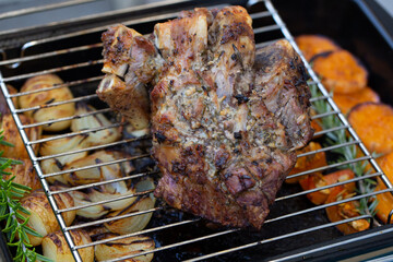 Roast lamb with rosemary and vegetables