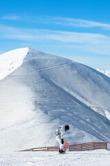 Tourists skiing in Palandoken mountain. Enjoying skiing on a sunny day