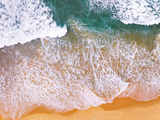 Sea surface aerial view,Bird eye view photo of crashing waves sandy shore,Sea water surface texture,sea background,Beautiful nature seascape,Amazing top view beach background
