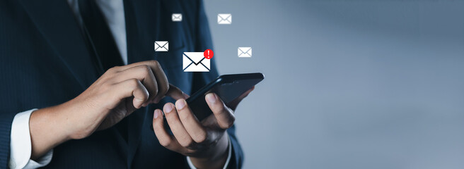 Business people touch on mobile phone. New email notification concept for marketing and business...