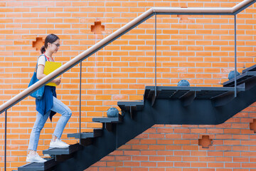 University student walk climb stairs step up in school campus to rise higher success smart woman...