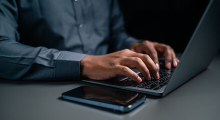 A man hand using laptop are working and Plan your savings money.