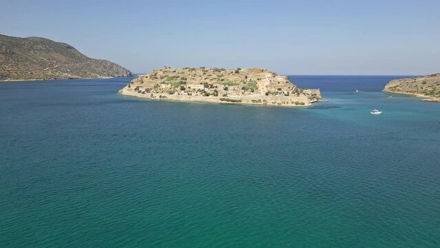 Drone view flying towards Spinalonga island in Lasithi, Crete, Greece
