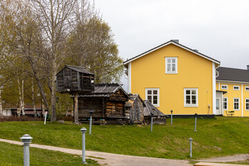 Obraz premium Arjeplog, Sweden Traditional timber houses on display in a park in the center of town.