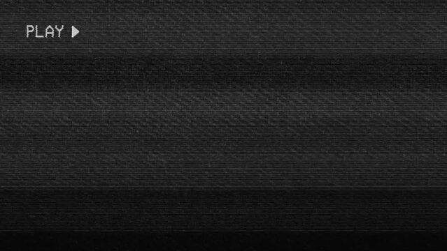 VHS damaged tape with analog noise and a play text on screen. Vintage 80s and 90s 4k footage looping	
