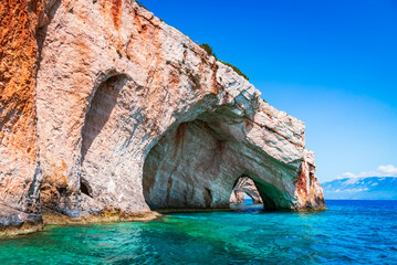 Zakynthos, Greece. Rock arches of Blue Caves, Agios Nikolaos port trip. - obrazy, fototapety, plakaty