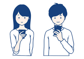 スマホを見る男女