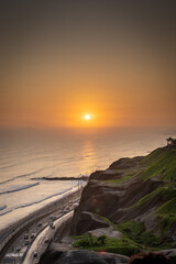 Sunset in la Costa Verde (Green Coast) in Lima, Peru - 612415503