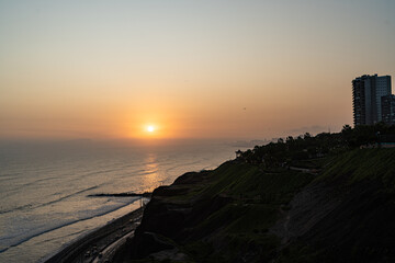 Sunset in la Costa Verde (Green Coast) in Lima, Peru - 612415508