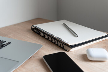 notebook and pen on the table