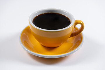closeup of coffee cup and saucer on white background
