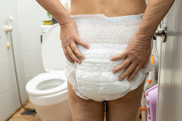 Asian senior woman patient wearing incontinence diaper in hospital, healthy strong medical concept. - obrazy, fototapety, plakaty